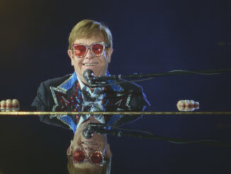 Elton John at the piano